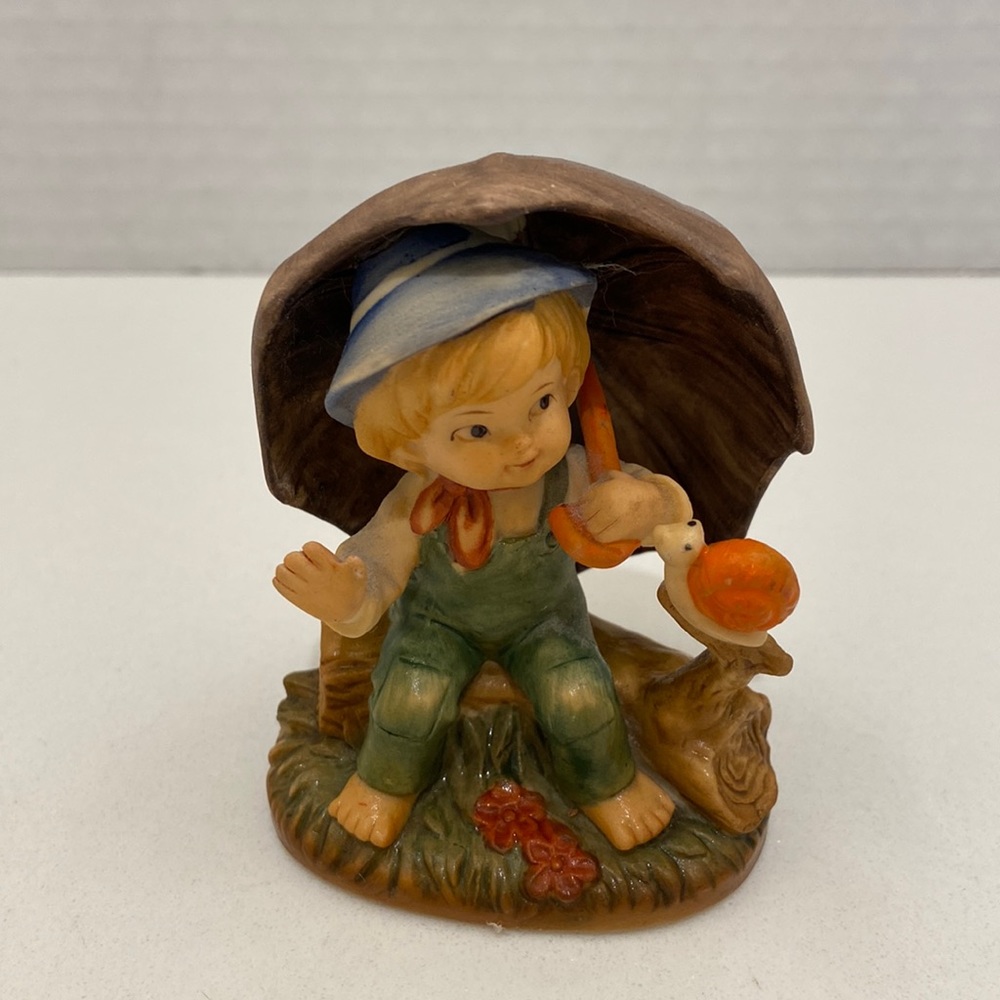 Napco vintage, porcelain boy holding umbrella with Snell # 177